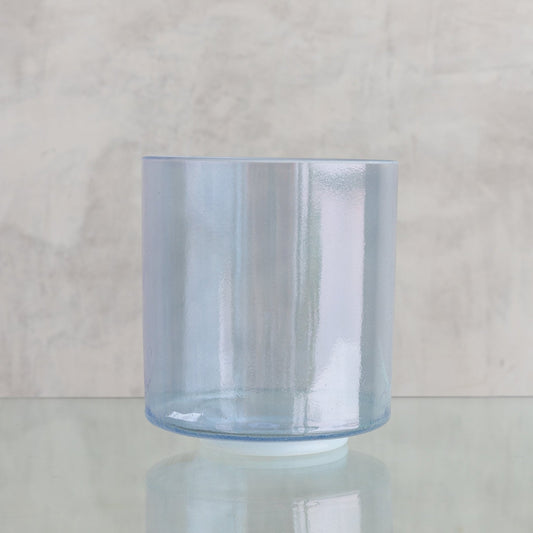 Crystal Tones 7-inch E+15 crystal singing bowl in Androgynous Indium, side view on a glass shelf
